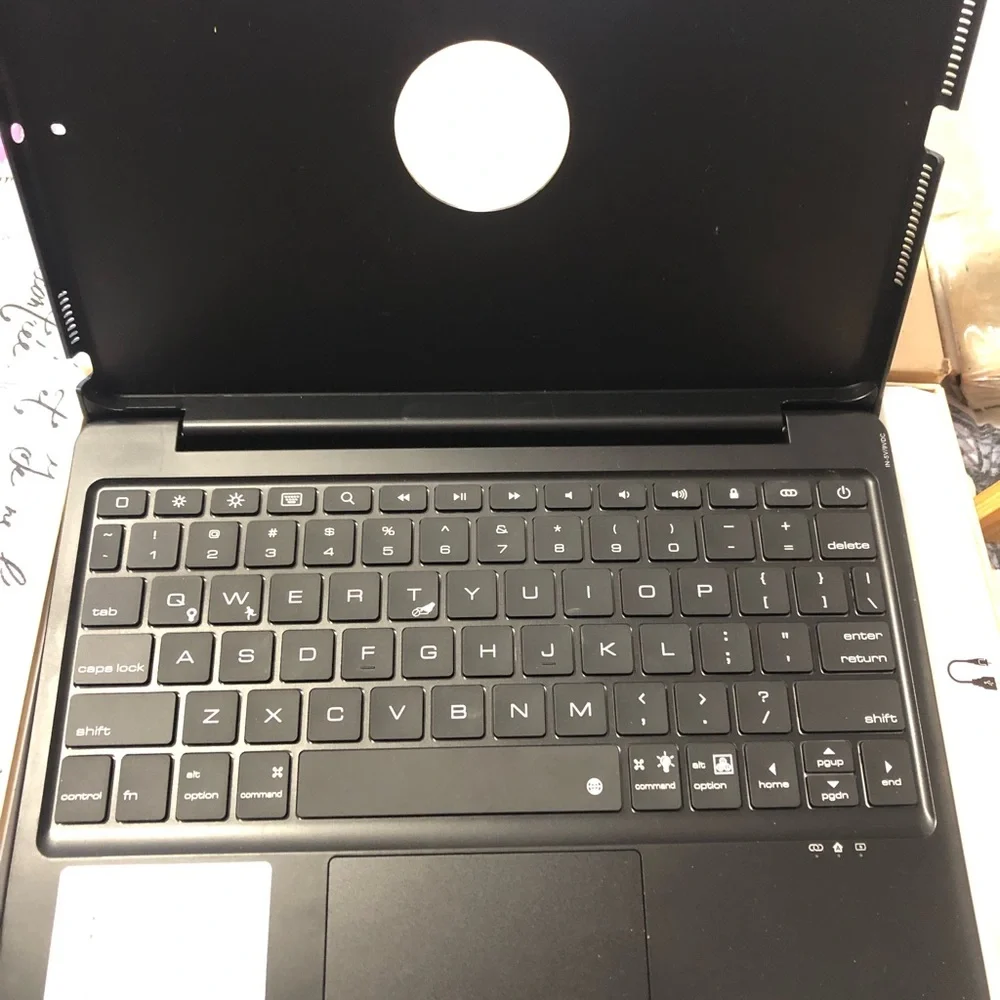 Sleek Black Bluetooth wireless keyboard and magnifying desk